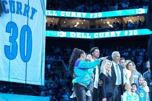 A deserved tribute for Dell Curry, who has his No. 30 jersey raised to the Charlotte rafters image